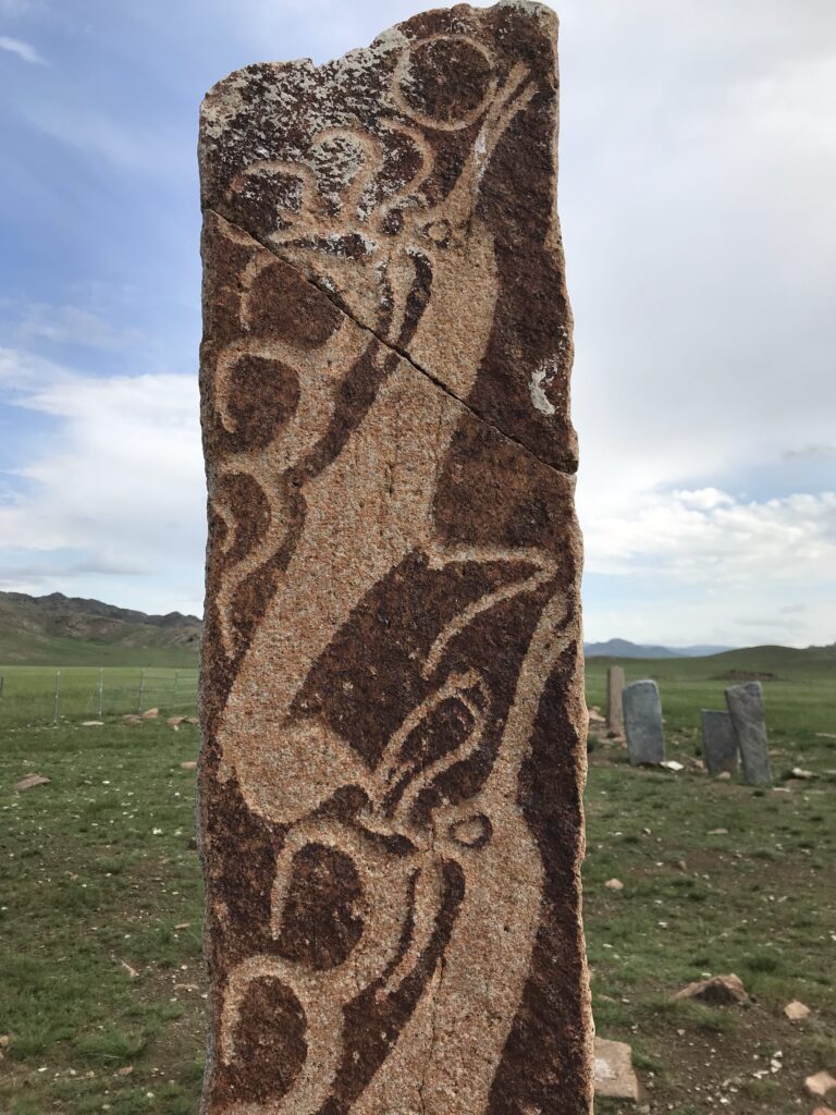 Intricately carved deer stone in Mongolia